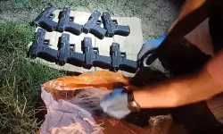 Polis Ekiplerini Görünce Silah Dolu Çantayı Balkondan Attı